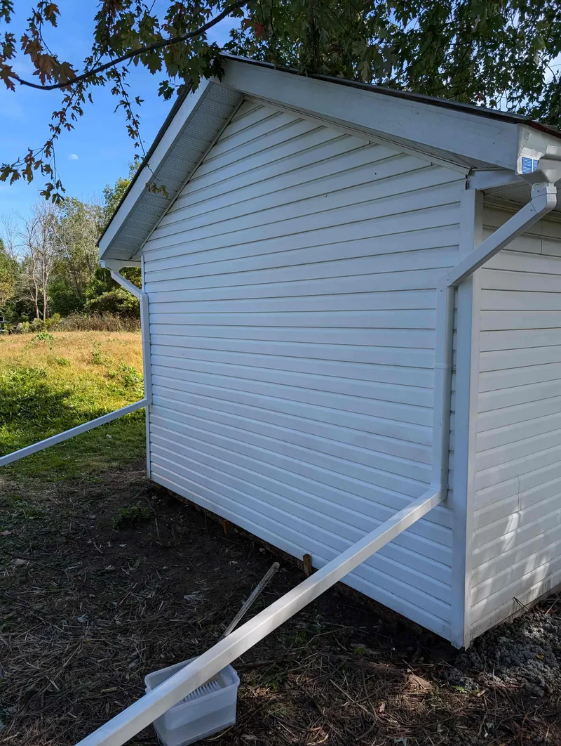 Downspouts routed away from the foundation